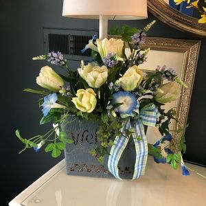 Metal wall pocket filled with summer flowers!